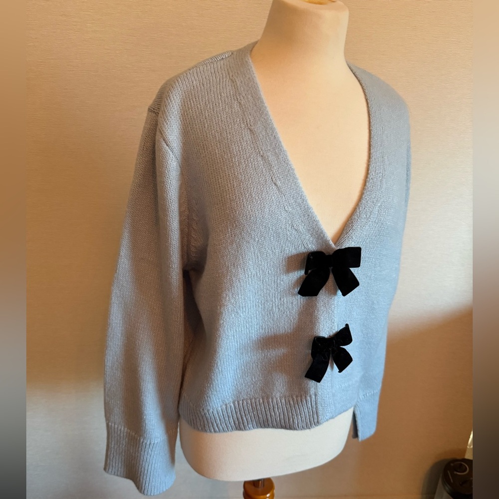Elegant Light Blue  Sweater with Black Bow Accents